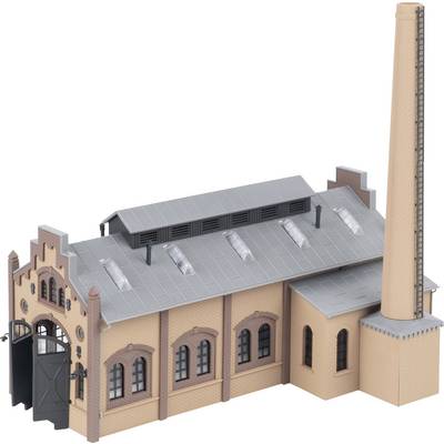 Isolated model of a brick industrial building with a tall smokestack, arched windows, and a gray metal roof, shown on a white background.
