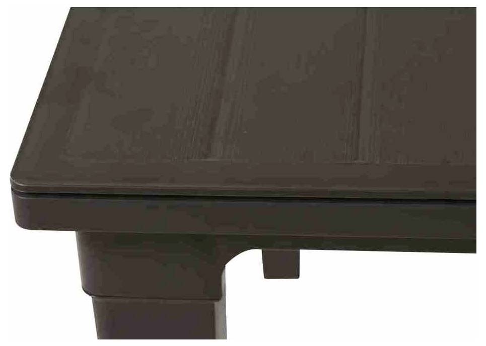 Close-up of a dark wood rectangular table or desk top with a visible leg and support bracket underneath on a white background.