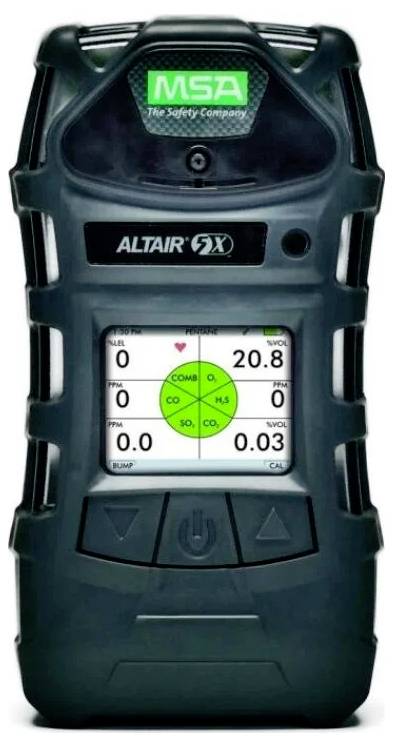 Black MSA ALTAIR 5X gas detector showing a digital screen with gas readings and a green status indicator.<br>