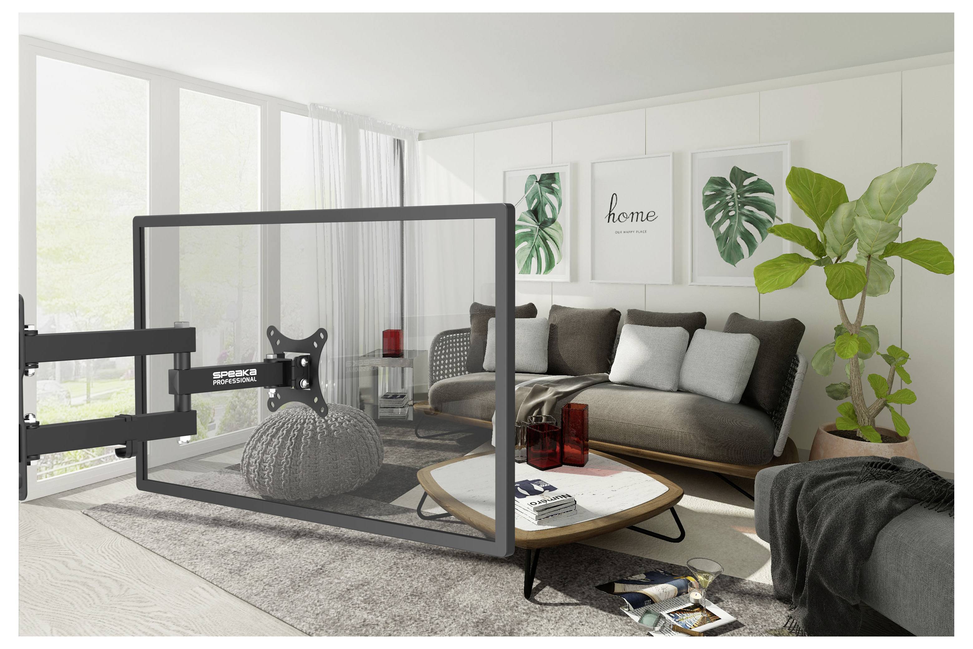 Modern living room with a gray sofa, round coffee table, framed wall art, large plant, and a TV mount frame in the foreground.