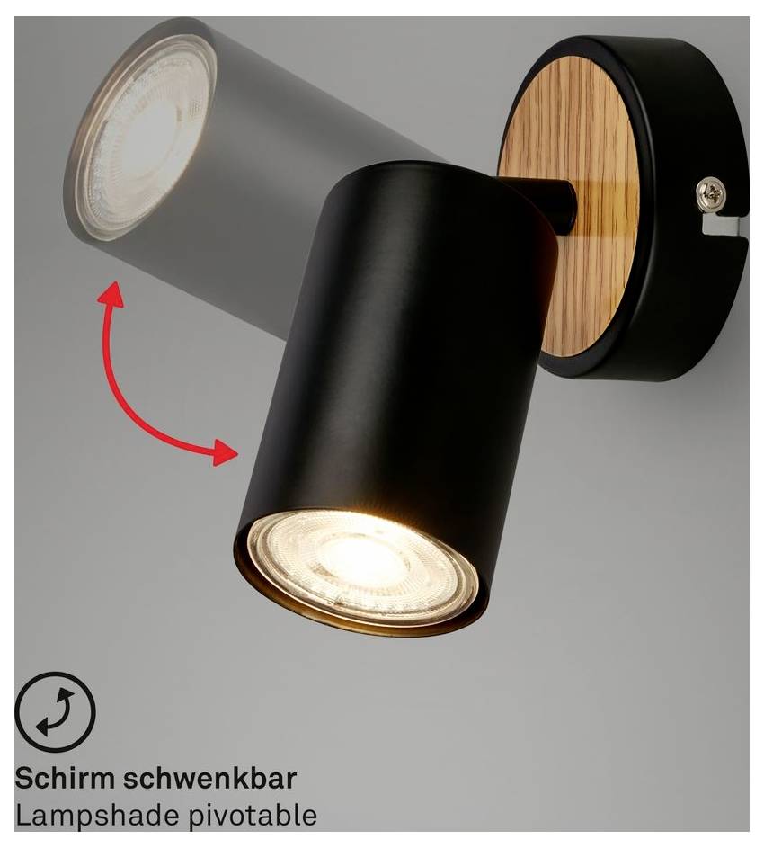 Wall-mounted black spotlight with pivotable lampshade shown rotating; text reads 'Schirm schwenkbar' and 'Lampshade pivotable'.