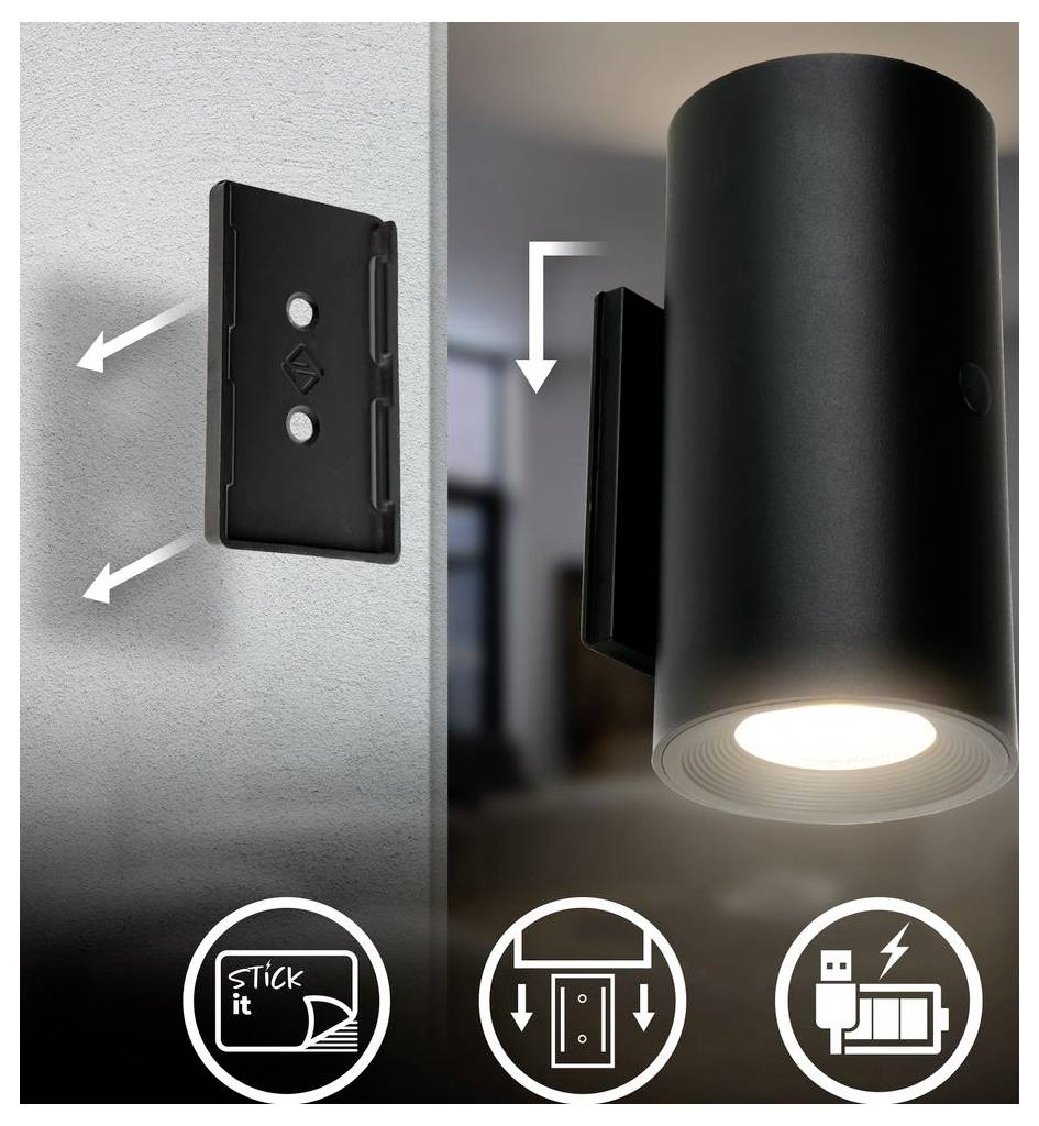Black wall light mount bracket shown installing a cylindrical sconce; arrows indicate slide-on attachment and adhesive or screw-free 'stick it' mounting.