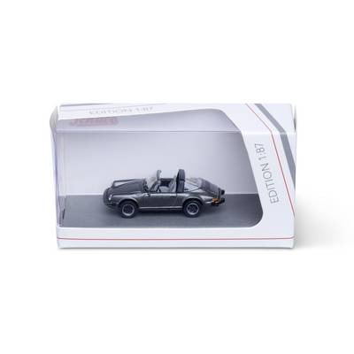 Black miniature convertible model car displayed in a clear plastic box labeled 'EDITION 1:87'.<br>