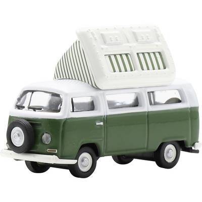Small green-and-white toy camper van with a roof tent, shown on a white background.
