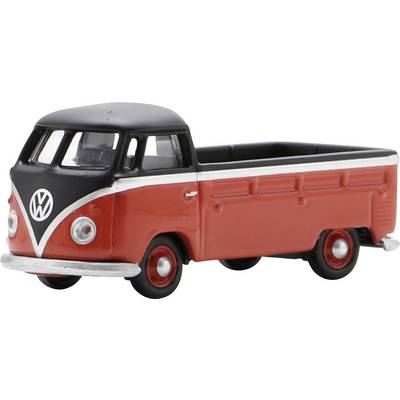 Red and black Volkswagen pickup truck model toy on a white background, shown in side view.