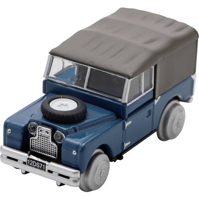 Blue toy off-road vehicle with gray soft top and spare tire mounted on the hood, shown on a white background.