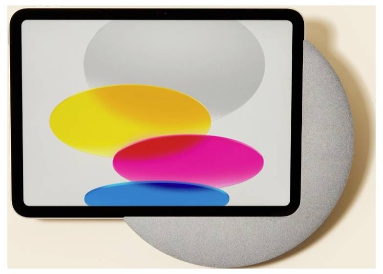 A tablet or smart display shows overlapping yellow, pink, and blue oval shapes on a white screen, mounted against a large gray circular background.