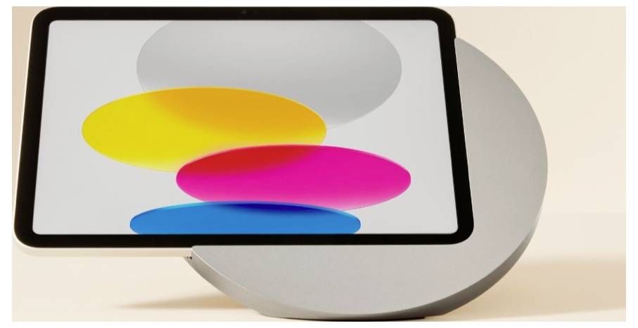 A tablet screen showing three overlapping ovals in yellow, pink, and blue on a light background, with a large gray circle behind it.