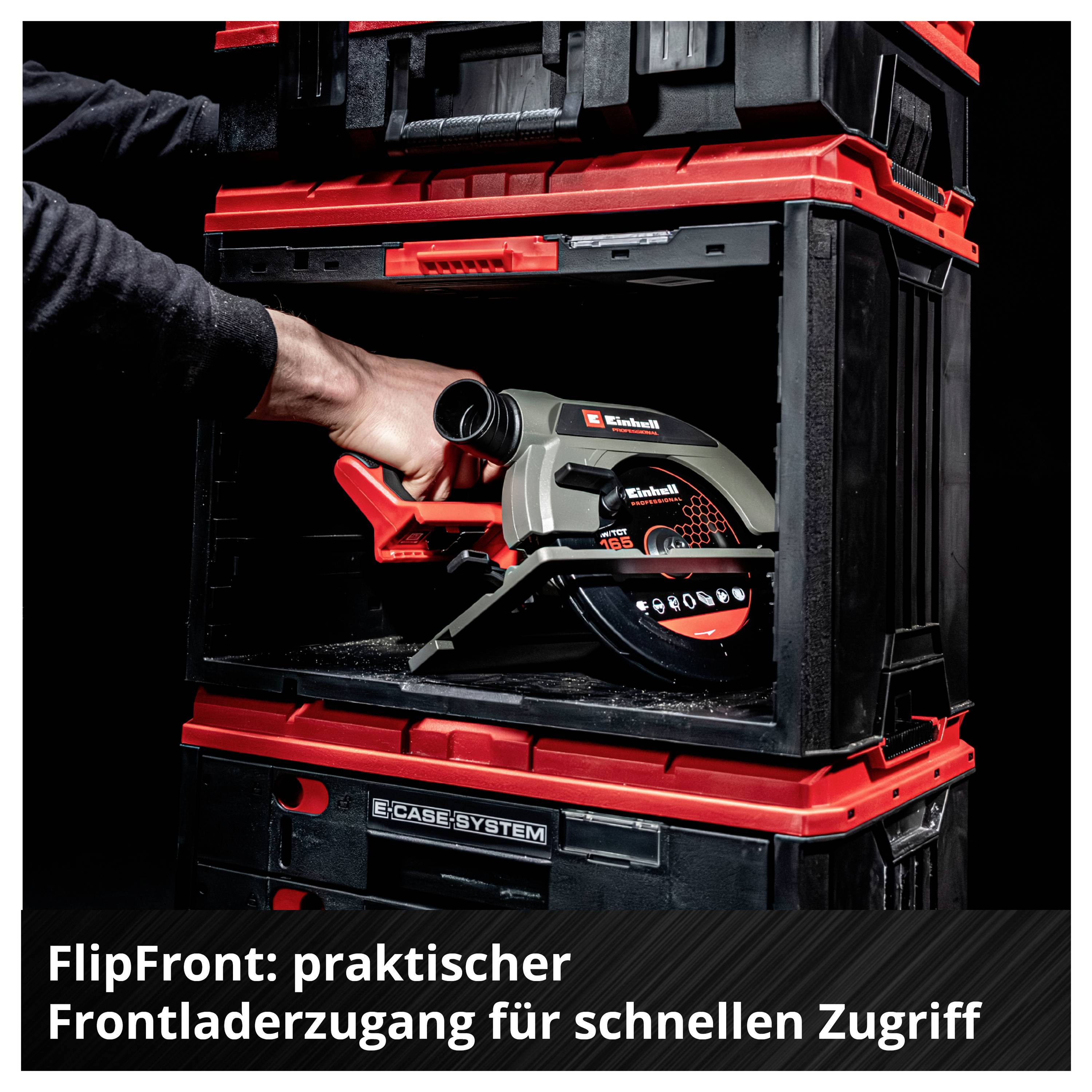 Hand places an Einhell hand saw into a black E-Case system with red boxes; Text: 'FlipFront: practical front-loader access for quick retrieval'