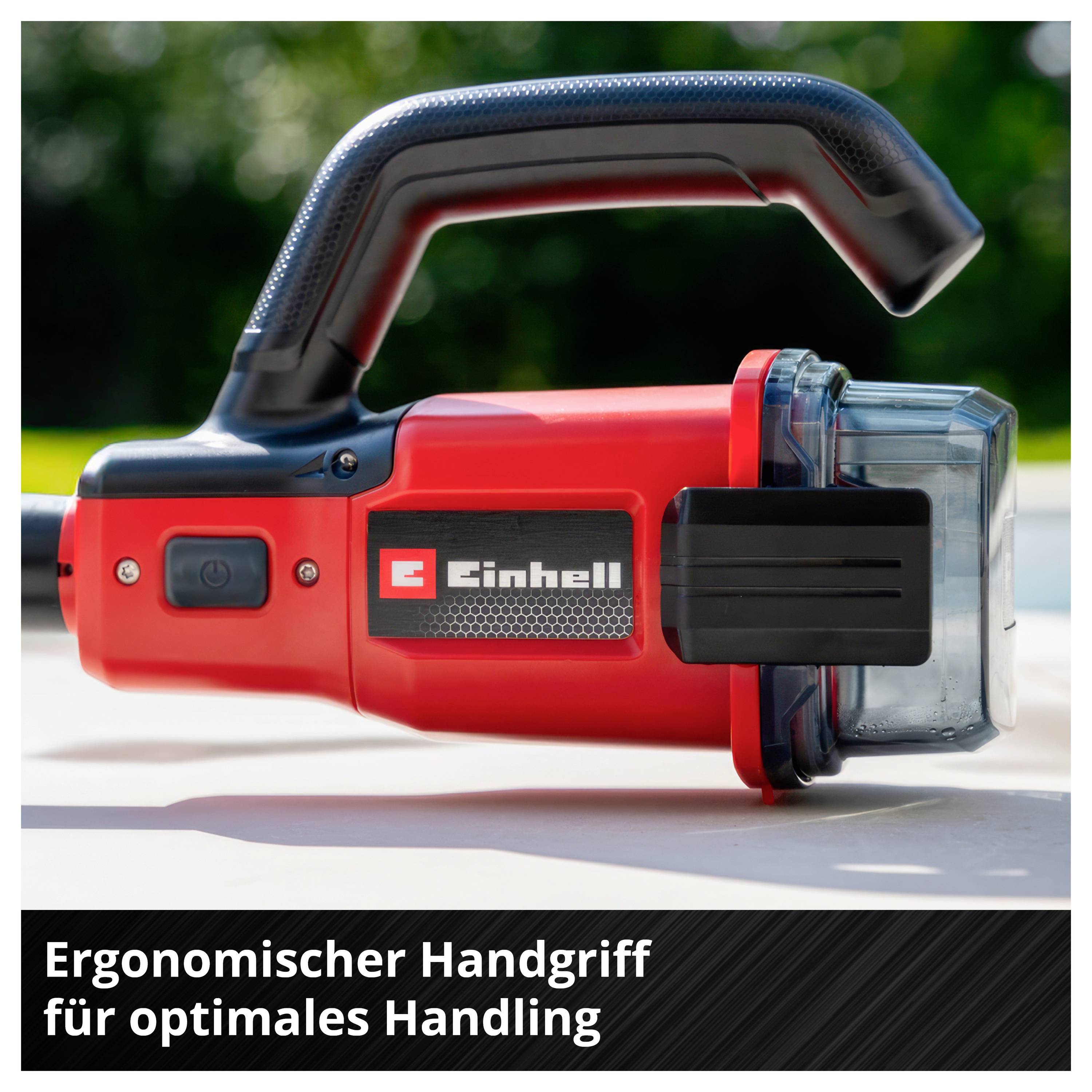 Red Einhell rechargeable hand lamp with handle and transparent front casing; Text: 'Ergonomic hand grip for optimal handling'.
