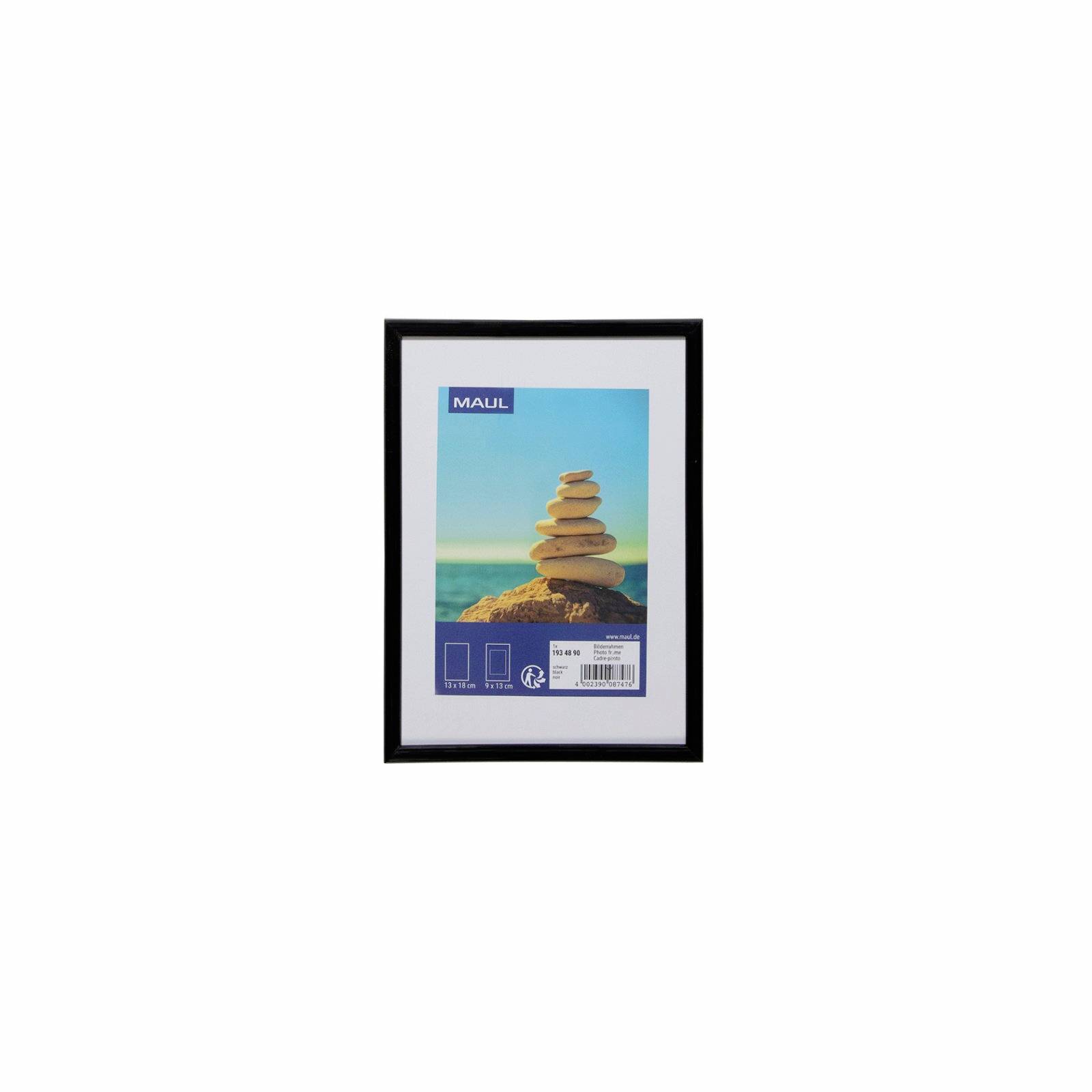 Black-framed picture frame with a sample beach-and-stacked-stones print labeled 'MAUL' inside.