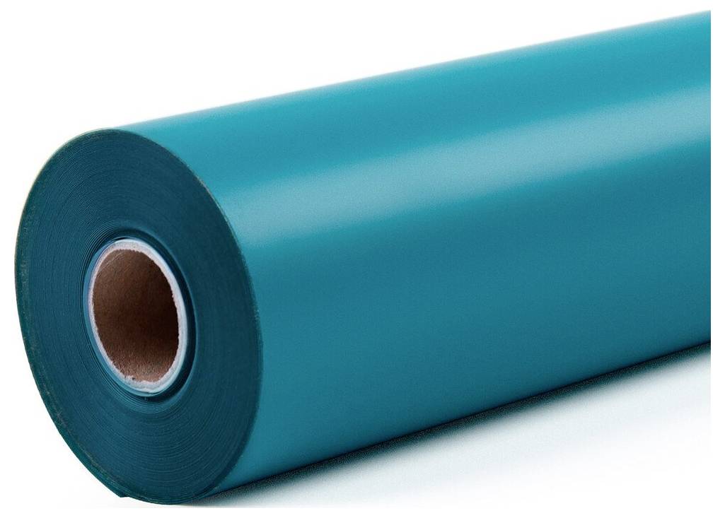 Large roll of teal-blue plastic or paper material on a spool, shown close-up against a white background.