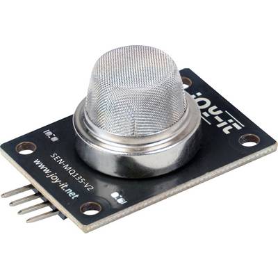 A MQ-135 gas sensor module on a black circuit board with a silver mesh sensor dome and four pin connectors.<br>