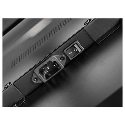 Close-up of a device power inlet and on/off rocker switch on a black electronic unit.