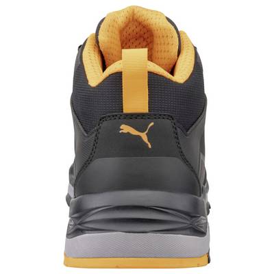 Rear view of a black and orange Puma athletic shoe with cushioned heel collar and gray sole.<br>