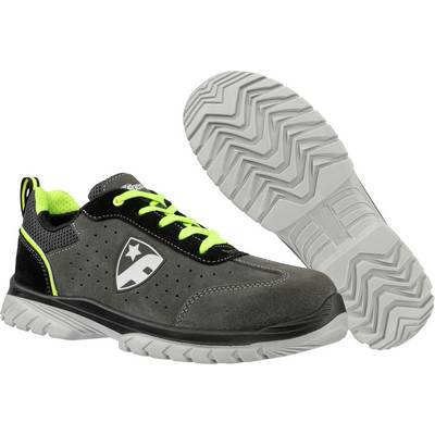 Black and gray athletic work shoe with neon green laces and lining, shown with the treaded sole visible.