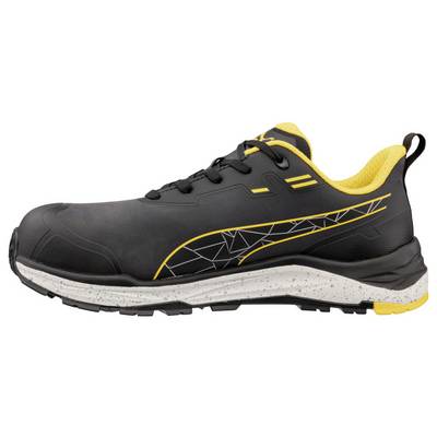 Black and yellow athletic trail shoe shown in side view with a rugged sole and geometric side graphic.