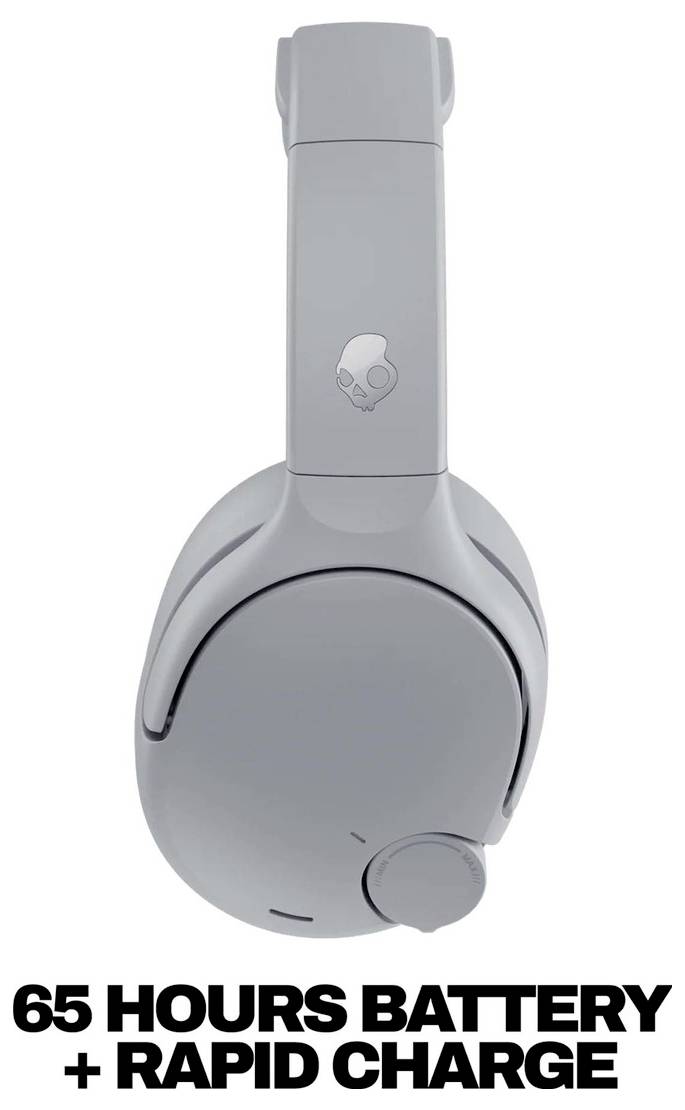 Gray over-ear headphones with a skull logo, shown front view, advertising '65 HOURS BATTERY + RAPID CHARGE'.