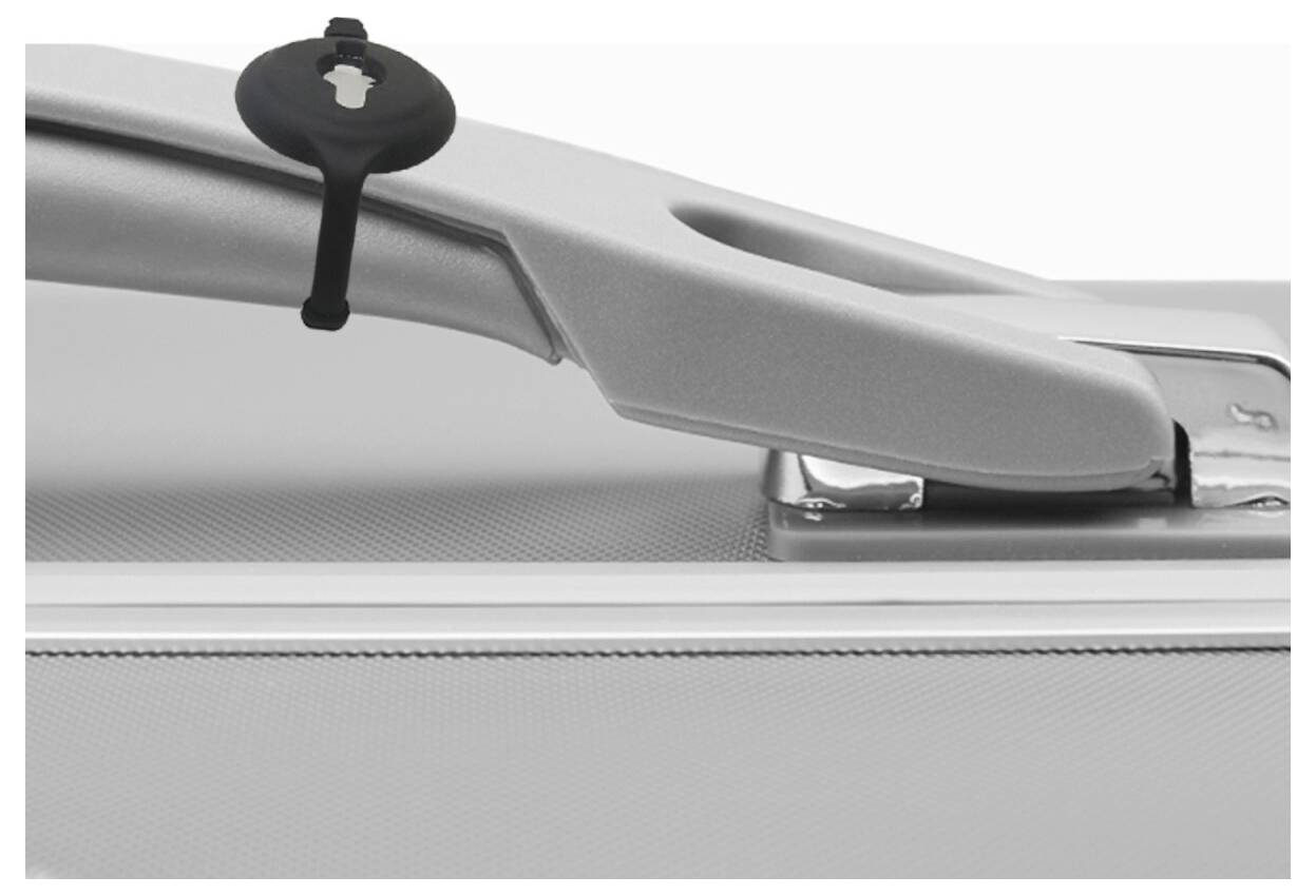 Close-up of a suitcase handle with a black luggage lock securing it shut.