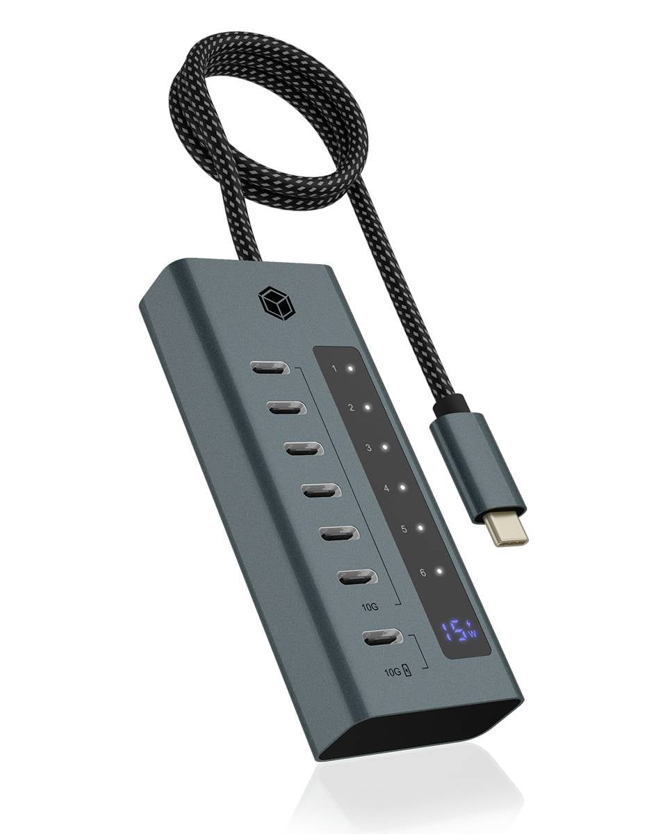 Portable USB-C hub with braided cable, multiple ports, and a blue digital power display showing 15W.<br>