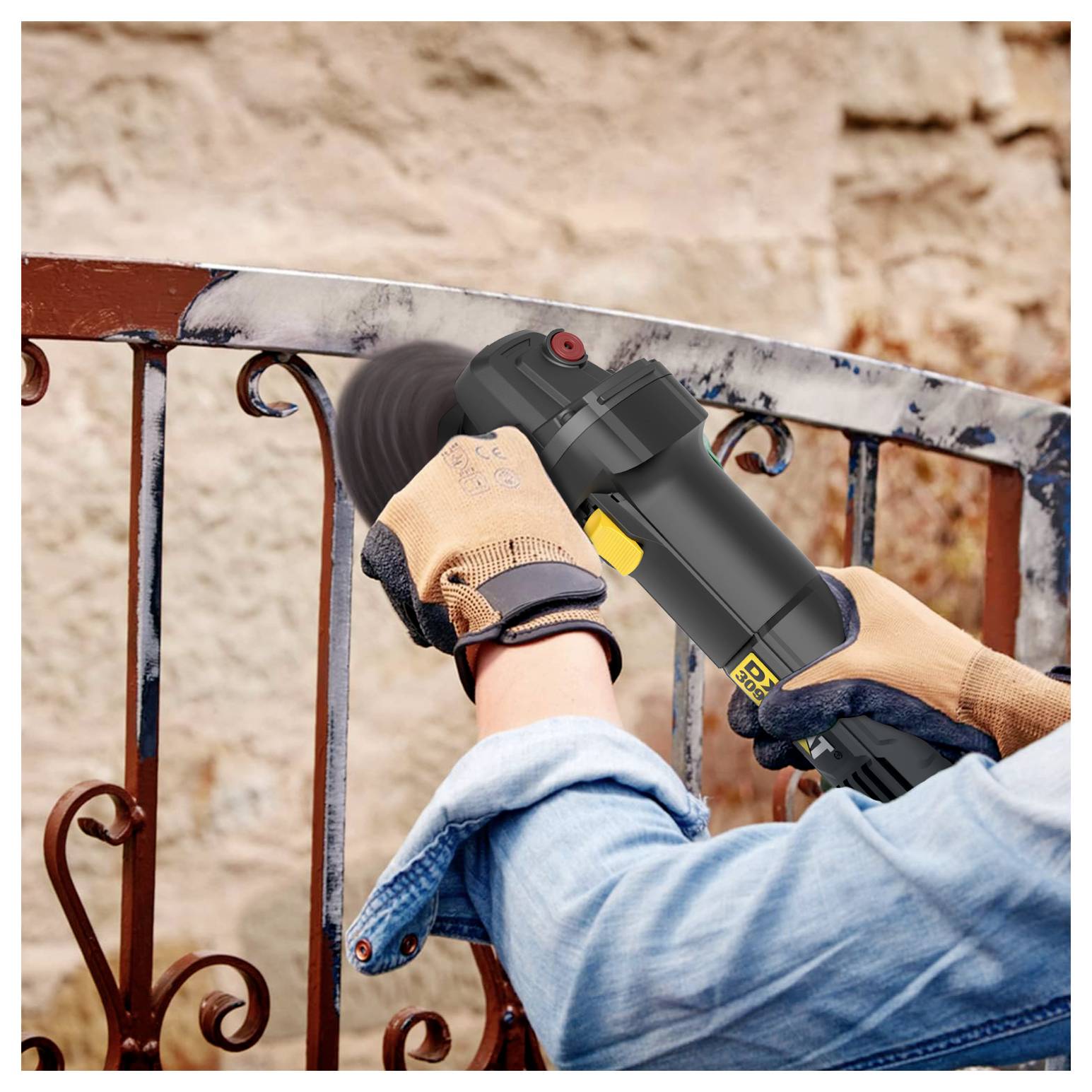 Person using a power sander to smooth a metal gate, wearing gloves and a denim shirt outdoors.