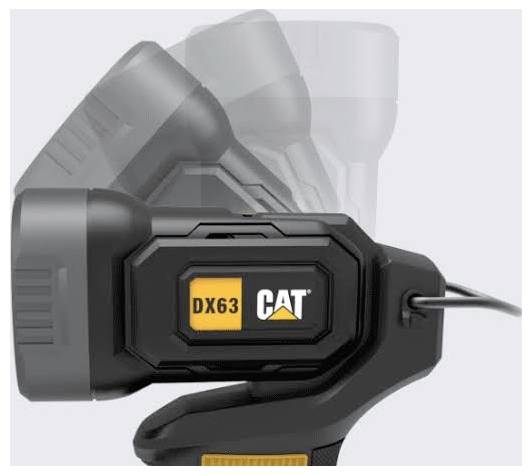 Black CAT DX63 power tool battery pack shown mounted on a cordless tool, with charging cable attached.<br>