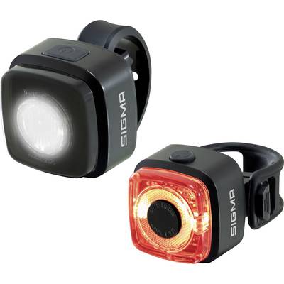 Two Sigma bicycle lights: a white front light and a red rear light, both compact and clip-mounted.