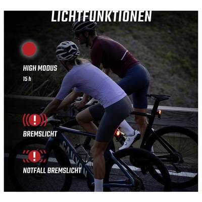 Advertising graphic with two cyclists at night; shows lighting functions of a bicycle: 'HIGH MODE' 15 h, 'BRAKE LIGHT' and 'EMERGENCY BRAKE LIGHT'.