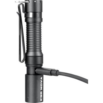 Black handheld flashlight with clip and side charging cable attached to the base on a white background.