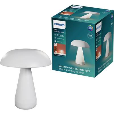White Philips LED portable mushroom-shaped lamp displayed beside its product box, labeled 2W and 'Decorate with portable light' for indoor use.