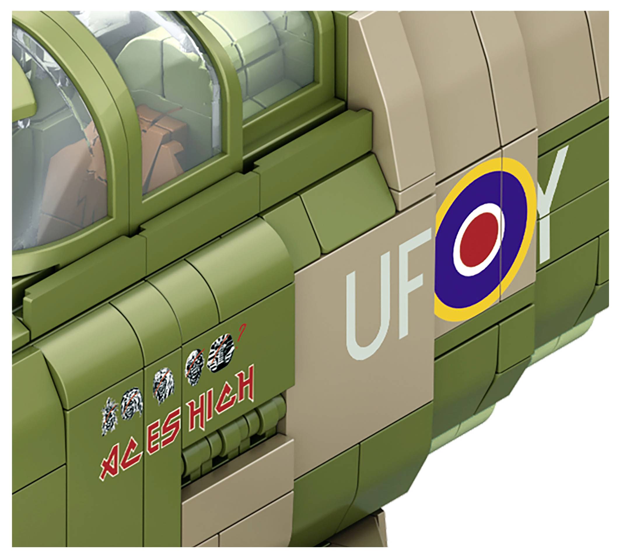 Close-up of a green military aircraft fuselage with roundel insignia, 'UF' lettering, and 'X HIGH' nose markings.