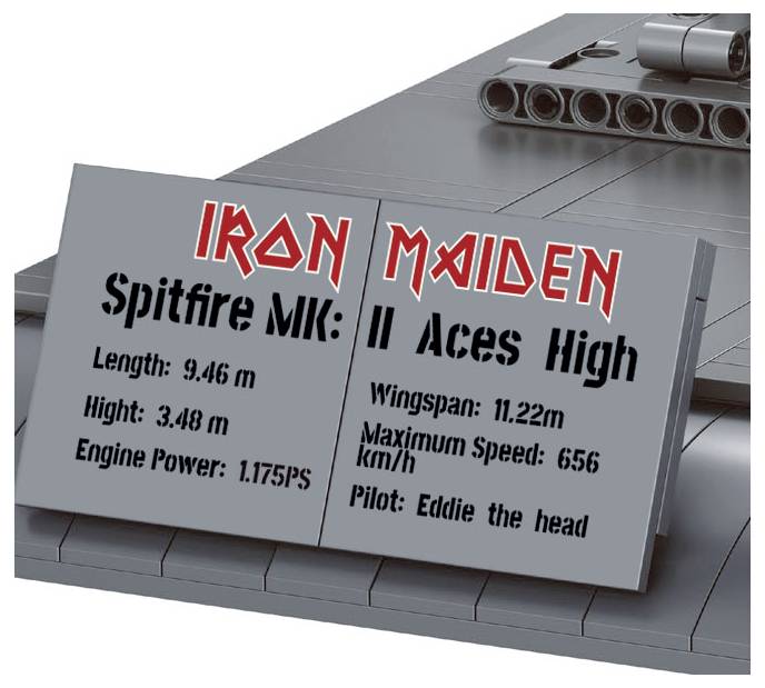Gray model plaque labeled 'IRON MAIDEN' and 'Spitfire Mk. II Aces High' with specs: length 9.46 m, height 3.48 m, wingspan 11.22 m, max speed 656 km/h, pilot Eddie the head.