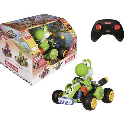 Carrera Mario Kart RC toy set showing a Yoshi kart, remote controller, and product box.<br>