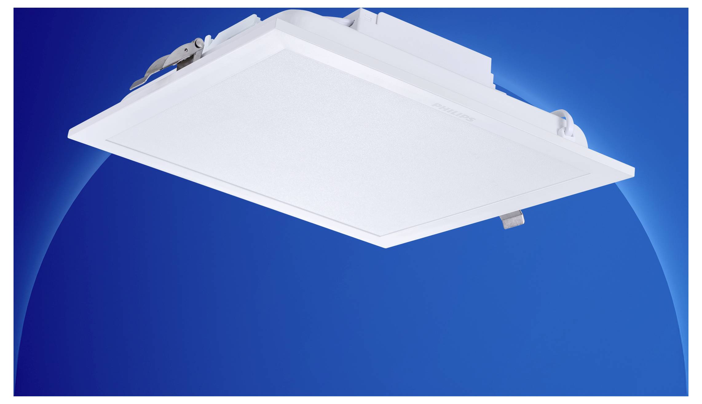 White recessed ceiling light fixture shown against a blue background.