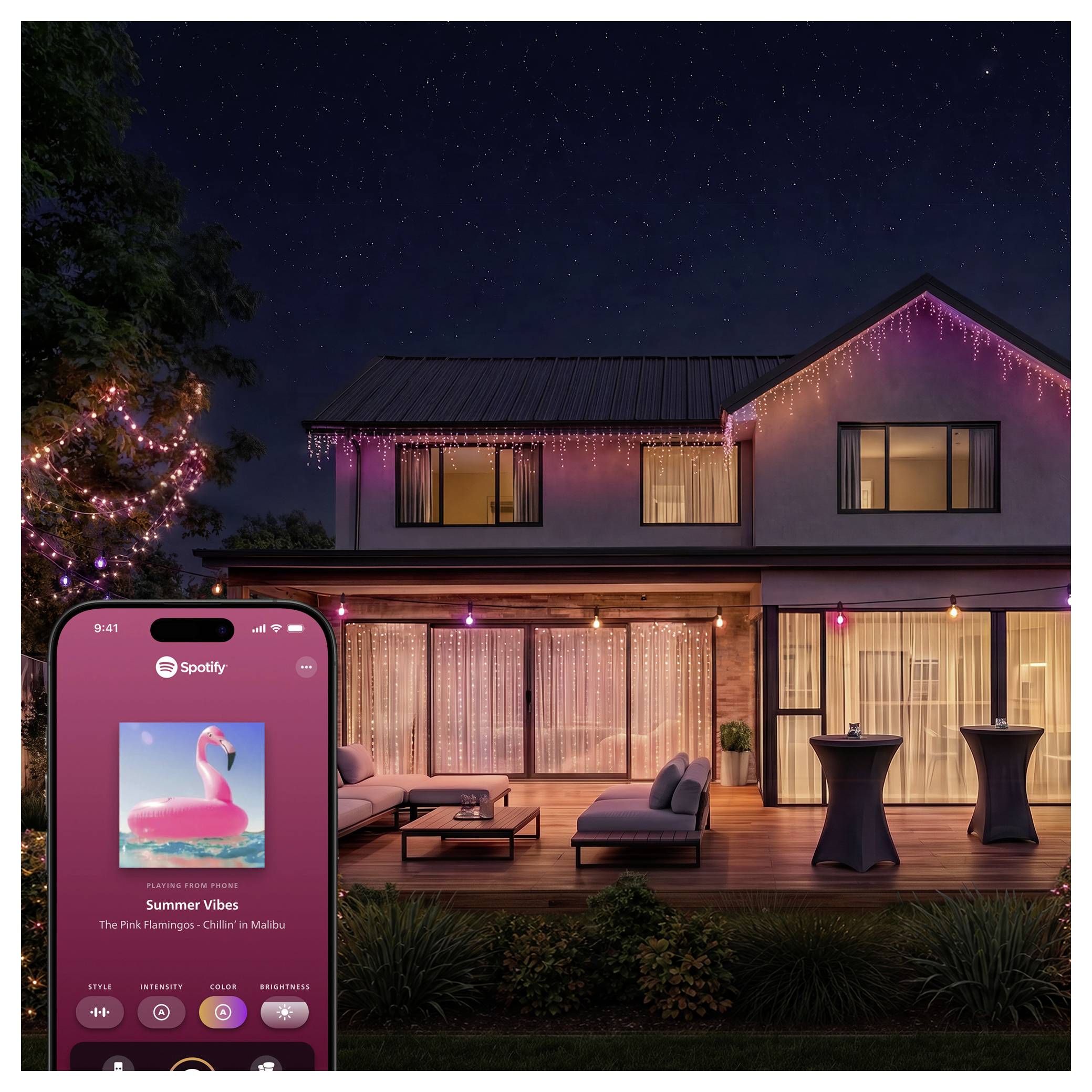 Nighttime house with pink string lights and patio furniture, overlaid with a phone showing Spotify playing 'Summer Vibes' by The Flamingos - 'Children in Malibu'<br>