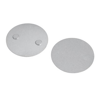 Two silver oval metal discs on a white background, one with two raised circular bumps and one plain.<br>