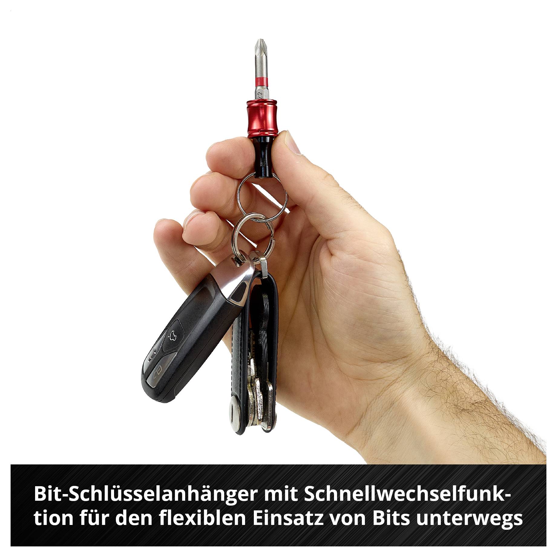 Hand holding a bit keychain with quick-change function and multiple bits for flexible use on the go.
