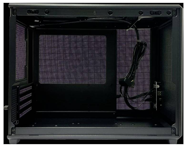 Empty computer case interior with mounted cable bundle and perforated side and rear ventilation panels.