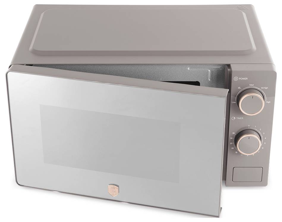 Compact microwave oven with a glass front door, two control knobs on the right, and a top-hinged lid on a white background.