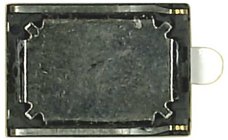 Black rectangular electronic component with a metal clip frame and a small looped tab on the right side.