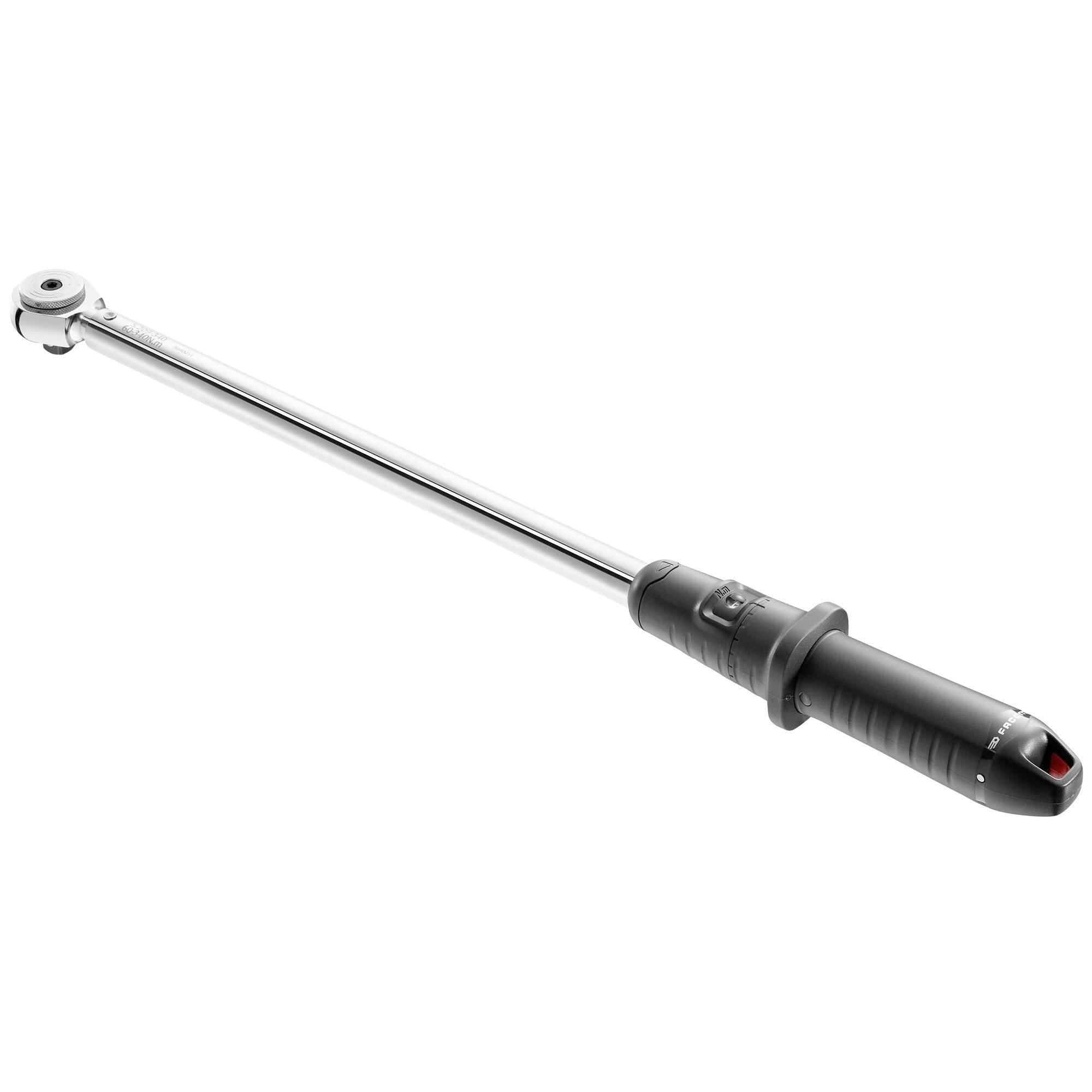 Adjustable torque wrench with long metal shaft and black rubber handle on a white background.
