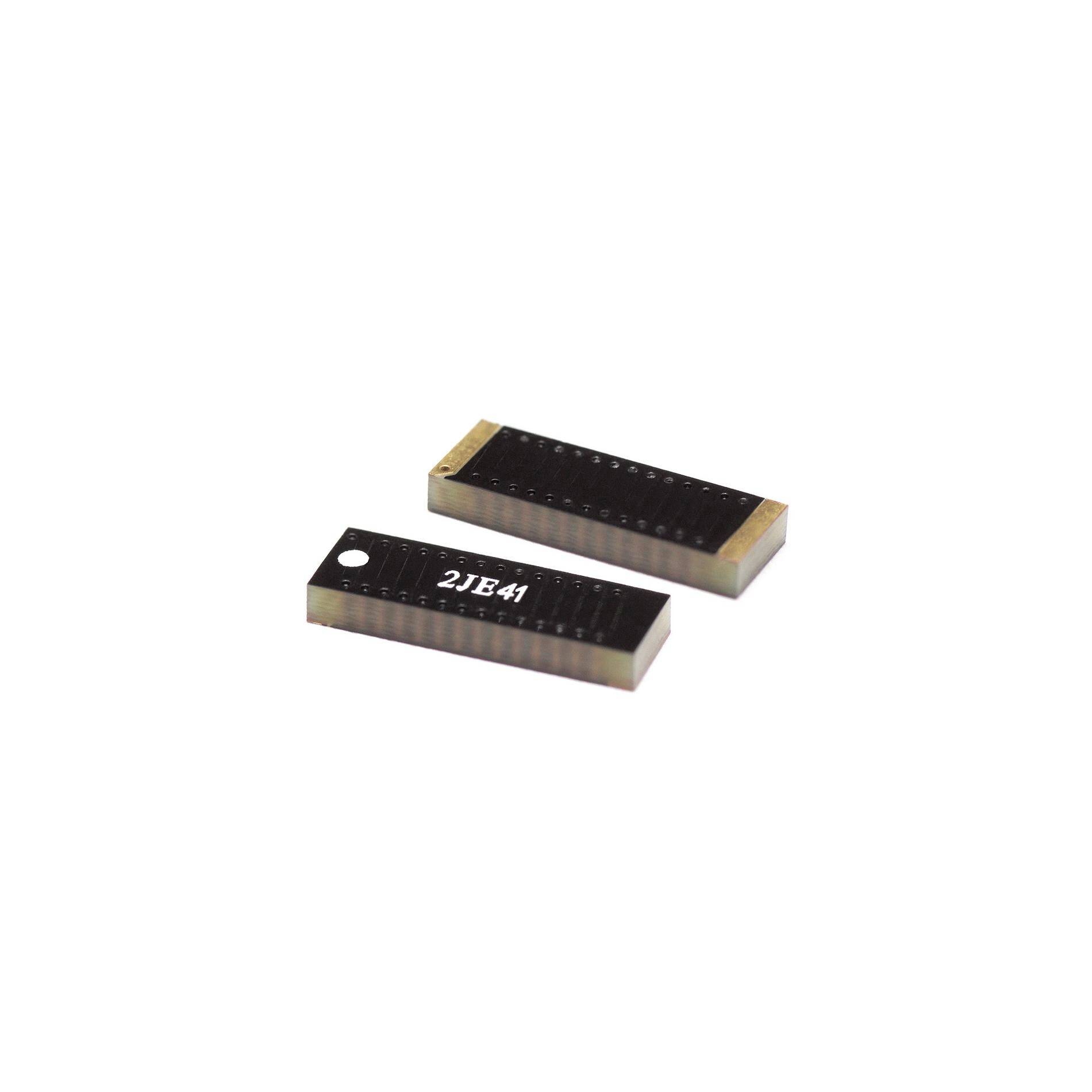 Two small black rectangular electronic components, one marked '2JB41' with a mounting hole, on a white background.