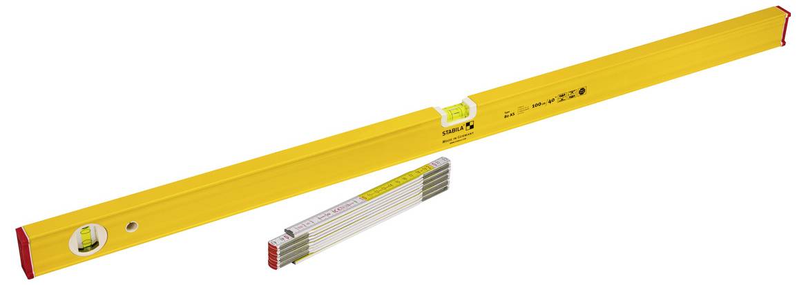 Yellow spirit level with red end caps and a central bubble vial, shown with a folded tape measure beneath it.