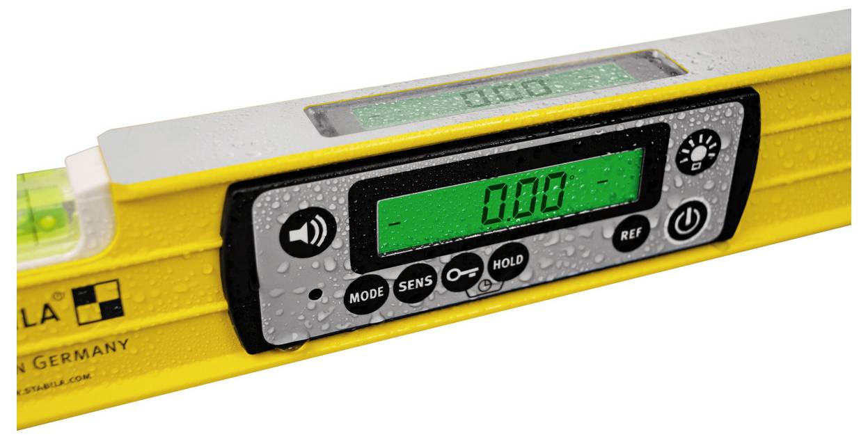 Close-up of a yellow digital spirit level with a green LCD reading '0.00' and control buttons on the front panel.