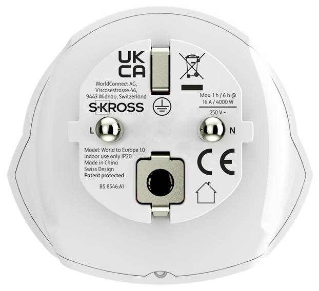 Front view of a white UK S-KROSS travel plug adapter with UK, CE, and power rating markings on the face.