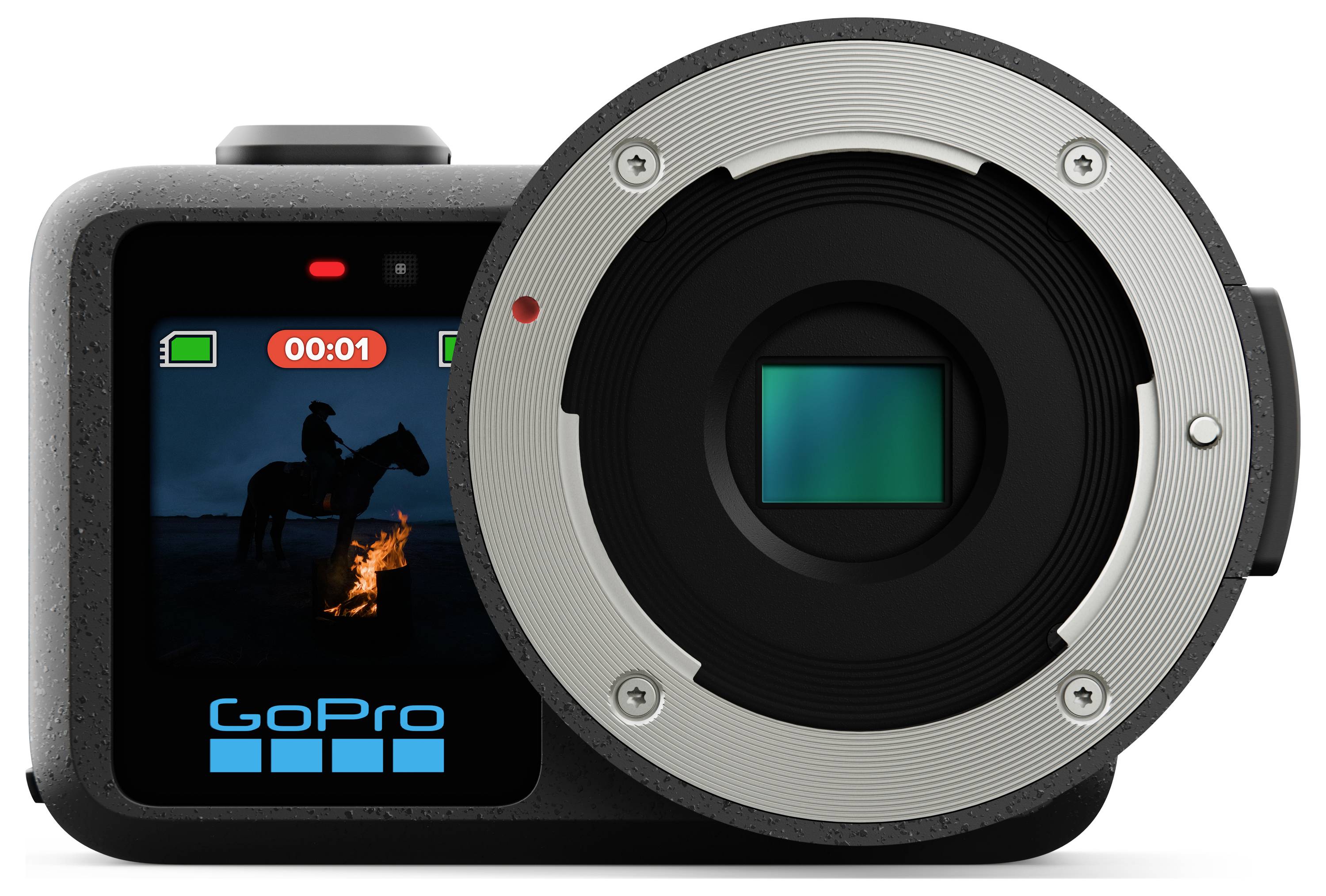 Front view of a GoPro action camera with a large lens adapter attached, showing a small rear screen with a night scene of a rider by a campfire.