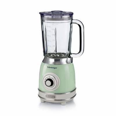 Mint-green countertop blender with glass pitcher, lid, and control dial on a white background.