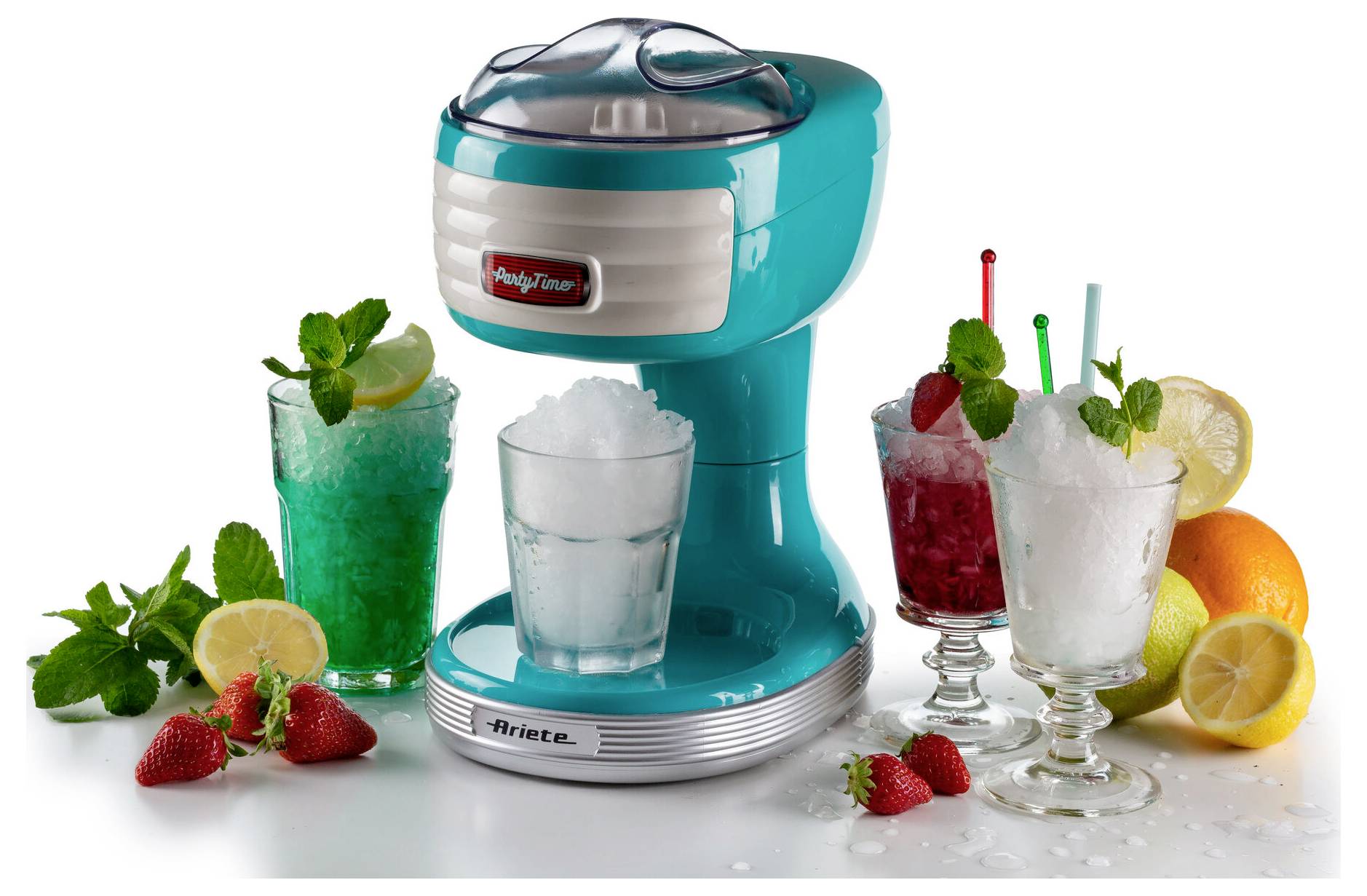 A turquoise slush machine dispensing frozen drinks into glasses, surrounded by colorful fruit garnishes and lemons, strawberries, and mint.