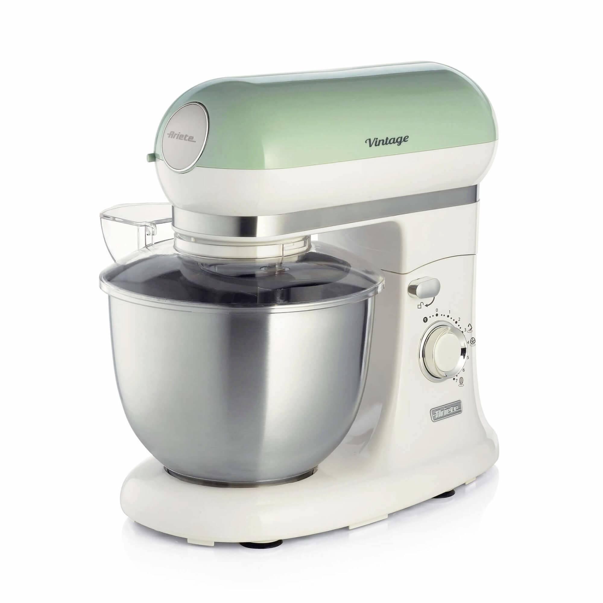 Mint-green and white stand mixer with stainless steel bowl and clear splash guard, shown on a white background.