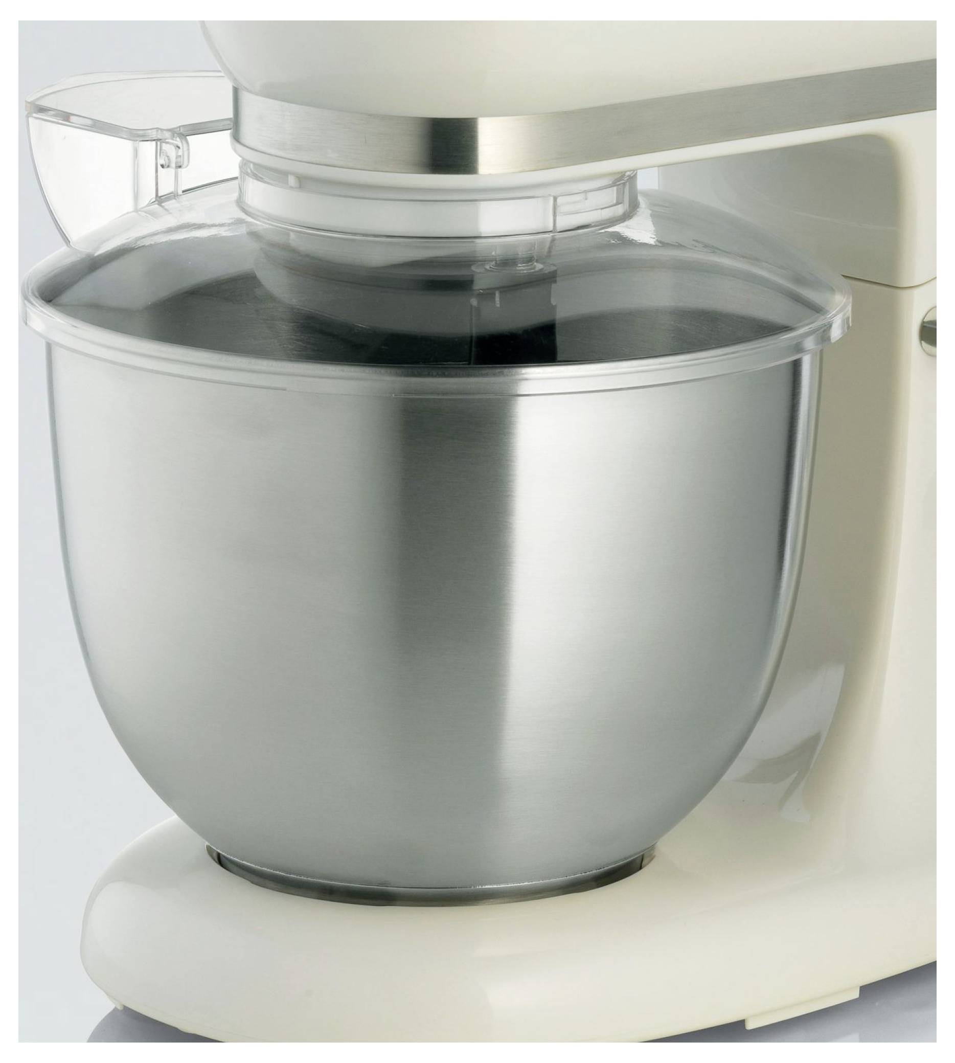 Close-up of a stand mixer with a stainless steel mixing bowl and clear splash guard.